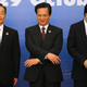Vietnam’s Prime Minister Nguyen Tan Dung tries to get Abe and China’s Wen Jiabao to hold hands.
